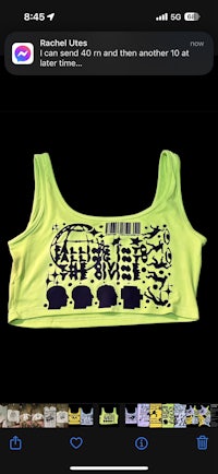 a photo of a green tank top with a message on it